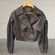 TRENCH COAT con elastico in vita ,doppio petto con collo revers, maniche a sbuffo